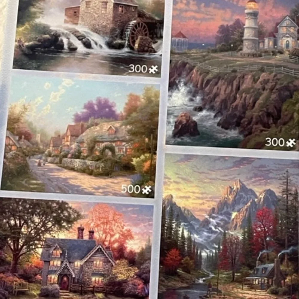 Thomas Kinkade set of 10 beautiful puzzles in one box
